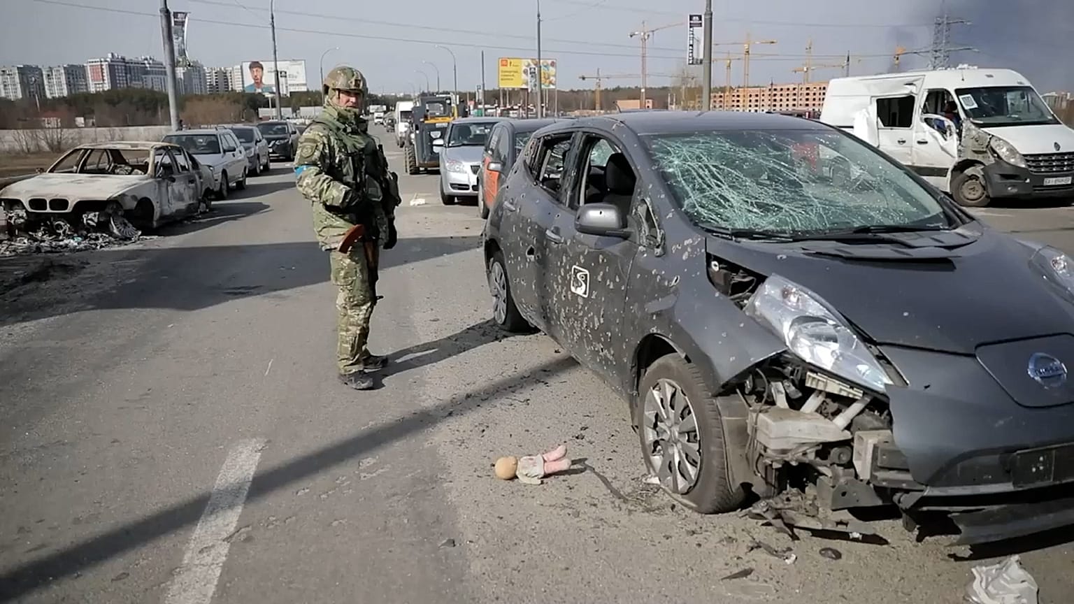 Footage released by police in Kyiv on Sunday, shows burnt out and damaged vehicles following attacks on a partially destroyed bridge in Irpin