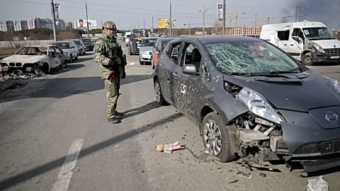 Footage released by police in Kyiv on Sunday, shows burnt out and damaged vehicles following attacks on a partially destroyed bridge in Irpin