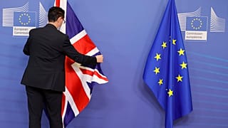 The United Kingdom and European Union flags are pictured at the EU headquarters in Brussels.