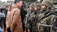Prime Minister of Spain Pedro Sanchez speaks to Spanish troops during his visit to Adazi Military base in Kadaga, Latvia, Tuesday, March. 8, 2022. 