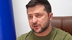 In this image from video provided by the Ukrainian Presidential Press Office and posted on Facebook, Ukrainian President Volodymyr Zelenskyy speaks