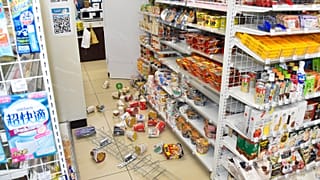 Products are scattered at a convenience store in Fukushima, northern Japan Wednesday, March 16, 2022, following an earthquake. 