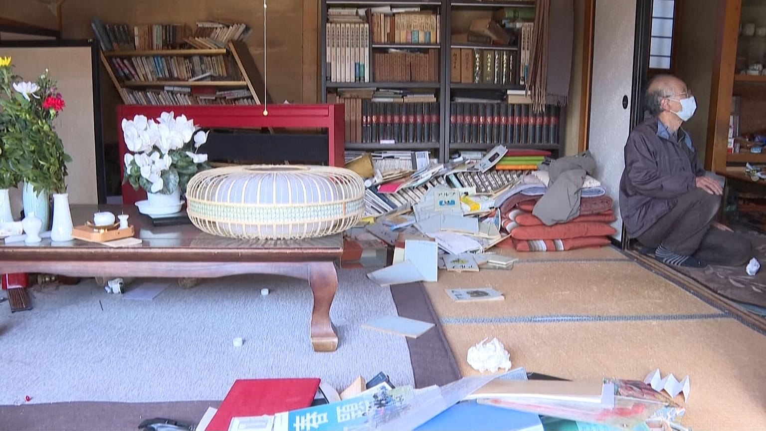 residents in the Japanese city of Soma taking refuge at an evacuation centre and of damages inside a home after a powerful overnight earthquake rattled large parts of Japan. 