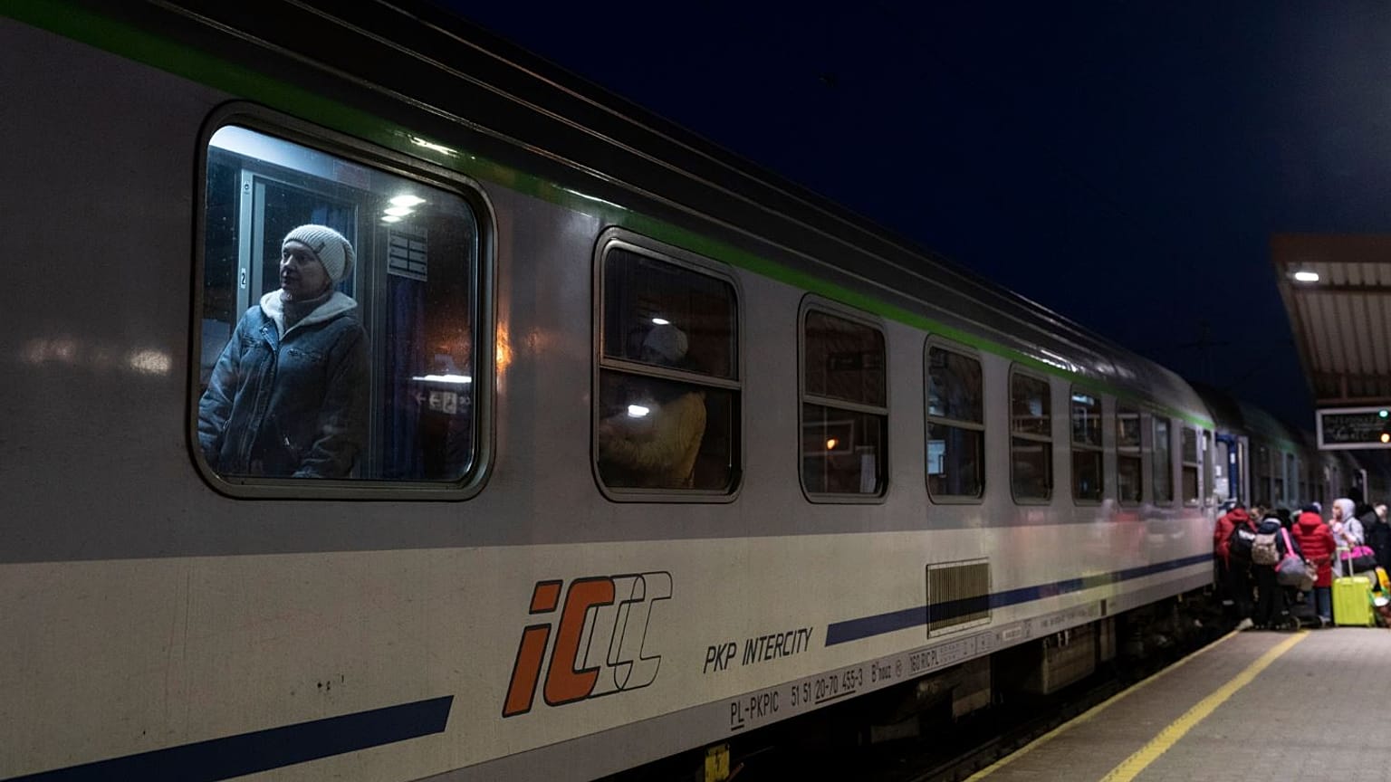 Ukrainian refugees embark a train bound to Warsaw at the Przemysl train station.
