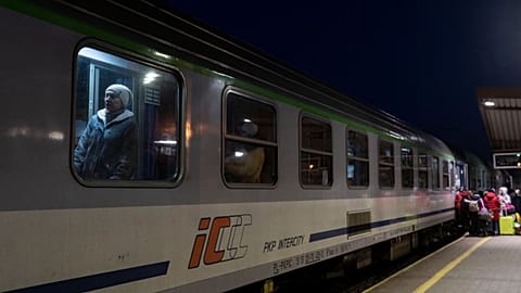 Ukrainian refugees embark a train bound to Warsaw at the Przemysl train station.