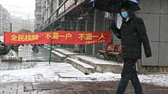 A slogan reads "All citizens Covid test, don't miss any household, don't miss any person" during a city wide lockdown, Changchun, China's Jilin province, March 14, 2022.
