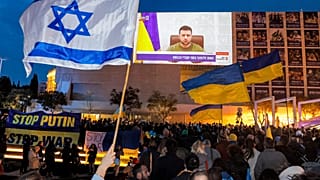 Demonstrators gather in Israel's Mediterranean coastal city of Tel Aviv on March 20, 2022 to attend a televised video address by Ukraine's President Volodymyr Zelenskyy.