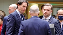 Dutch Foreign Minister Wopke Hoekstra (L) and Lithuanian Foreign Minister Gabrielius Landsbergis (R) at a meeting in Brussels, Mar. 21, 2022.