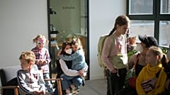 Refugee children from Ukraine wait with their mothers for the start of their classes in Berlin, Germany, March 21, 2022. 