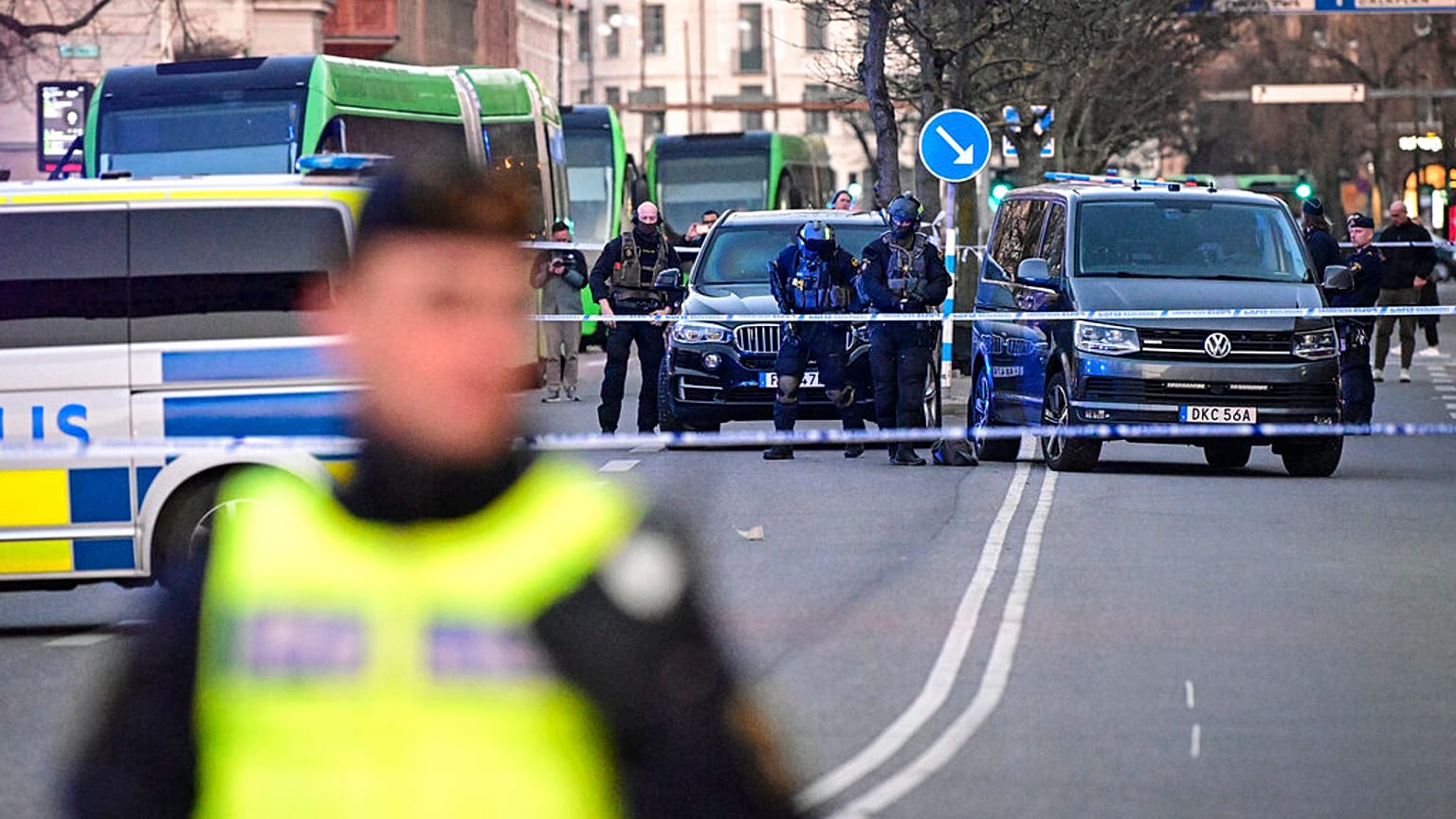 Police officers attend the scene at a school in Malmo, Sweden on Monday, March 21, 2022