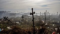 Graves dug in Ukraine, amid the Russian invasion.
