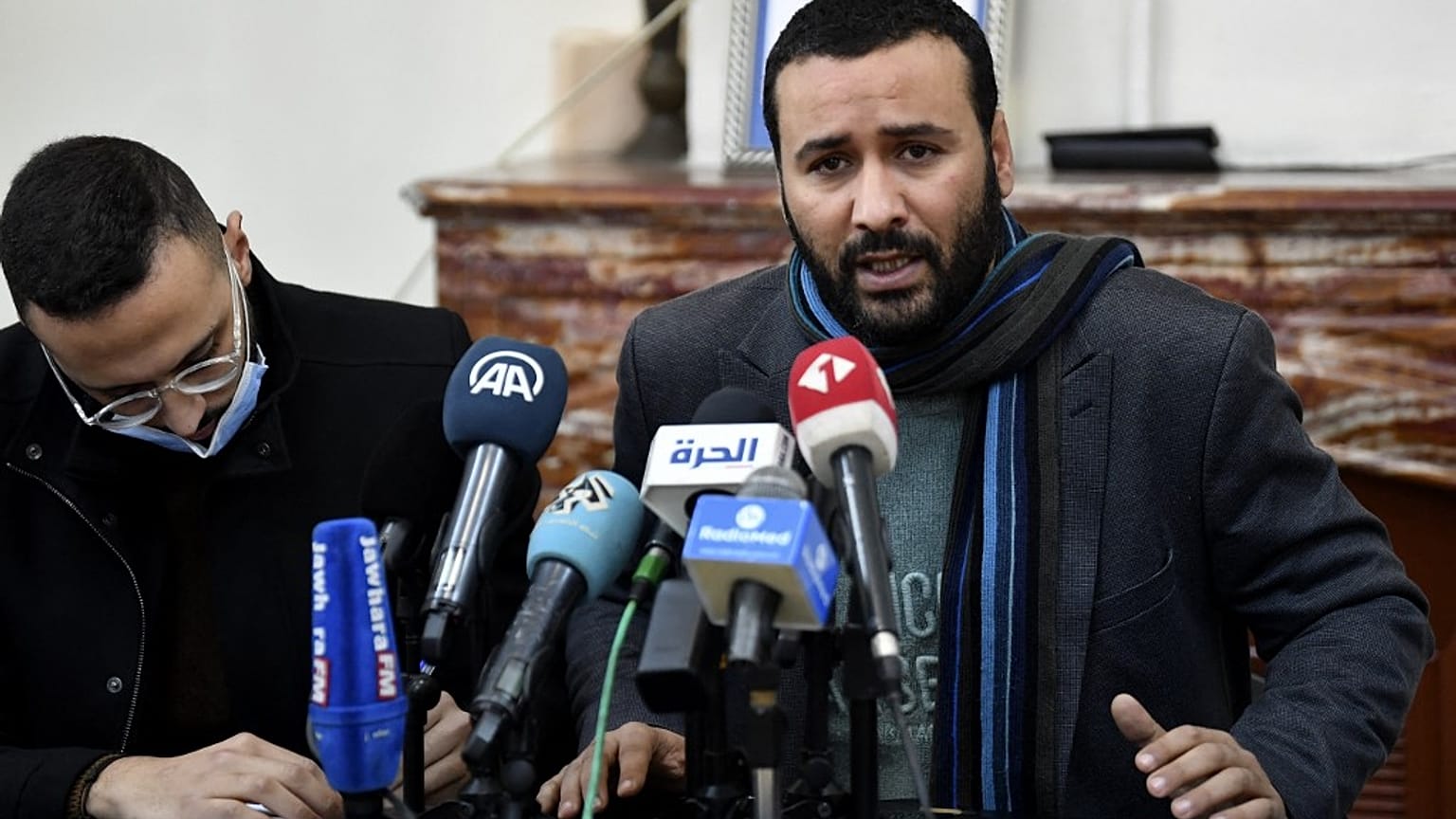 رئيس النقابة الوطنية للصحفيين التونسيين، خلال مؤتمر صحفي في العاصمة تونس في 18 يناير 2022.