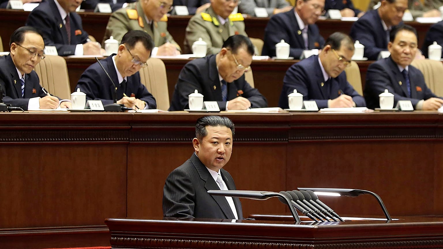 North Korean leader Kim Jong Un, bottom, attends at a meeting of the Workers' Party of Korea in Pyongyang, North Korea on Feb. 28, 2022.