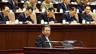 North Korean leader Kim Jong Un, bottom, attends at a meeting of the Workers' Party of Korea in Pyongyang, North Korea on Feb. 28, 2022.