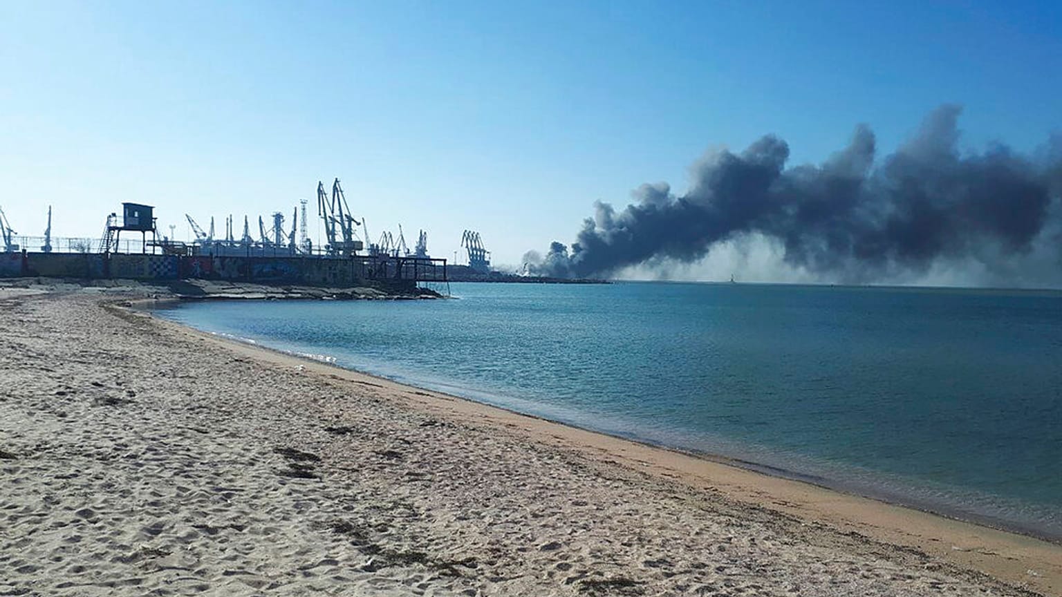Smoke rises after shelling near a seaport in Berdyansk, Ukraine, Thursday, March 24, 2022. 