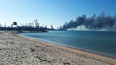 Smoke rises after shelling near a seaport in Berdyansk, Ukraine, Thursday, March 24, 2022. 