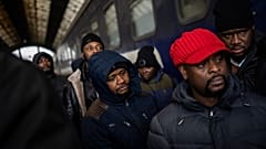 African residents in Ukraine wait at the platform inside Lviv railway station, Sunday, Feb. 27, 2022, in Lviv, west Ukraine.