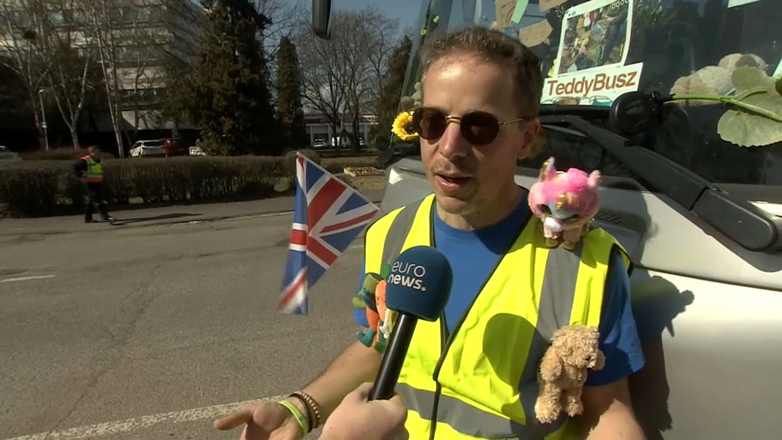 A volunteer from England who travelled to Hungary to distribute teddy bears to children. 