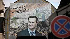 لافتة دعم لبشار الأسد في دمشق