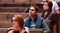 Volunteer ballot counters listen to a presentation in Budapest, Hungary, Thursday, March 24, 2022. 