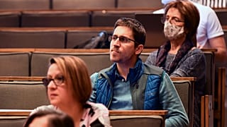 Volunteer ballot counters listen to a presentation in Budapest, Hungary, Thursday, March 24, 2022. 