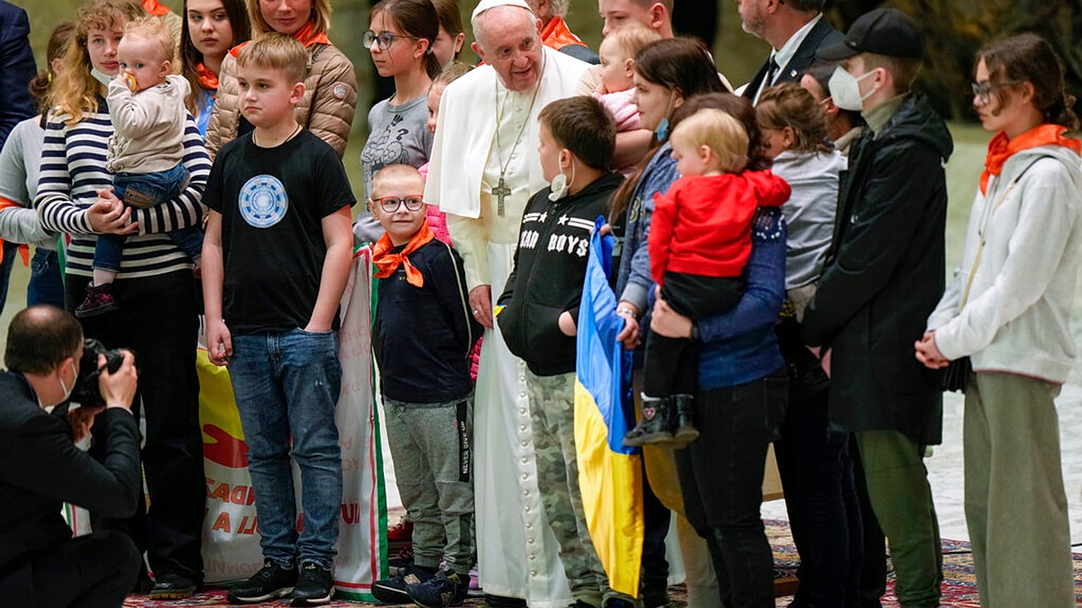 Pope Francis, center, poses for a photo with the Ukraine's Ambassador to the Holy See
