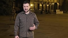 Ukrainian President Volodymyr Zelenskyy speaks from Kyiv, Ukraine, Wednesday night, March 30, 2022