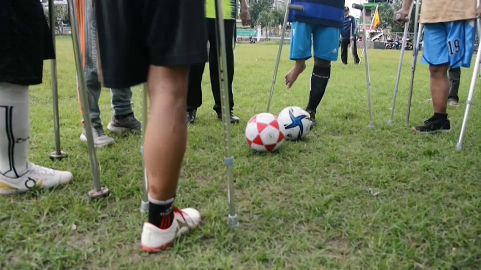 A team of amputees in Indonesia's Surabaya train intensively for an upcoming tournament in the capital Jakarta. They formed a football club as a way of fighting despondency.