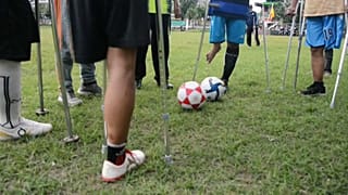 A team of amputees in Indonesia's Surabaya train intensively for an upcoming tournament in the capital Jakarta. They formed a football club as a way of fighting despondency.