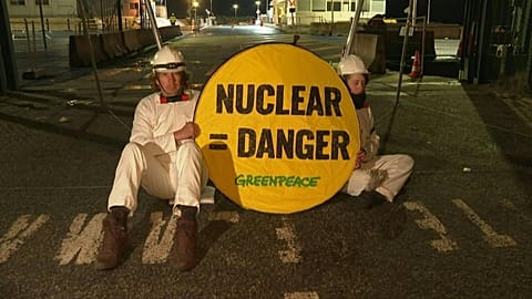 Greenpeace activists blocking access to the site of the Flamanville EPR nuclear reactor 