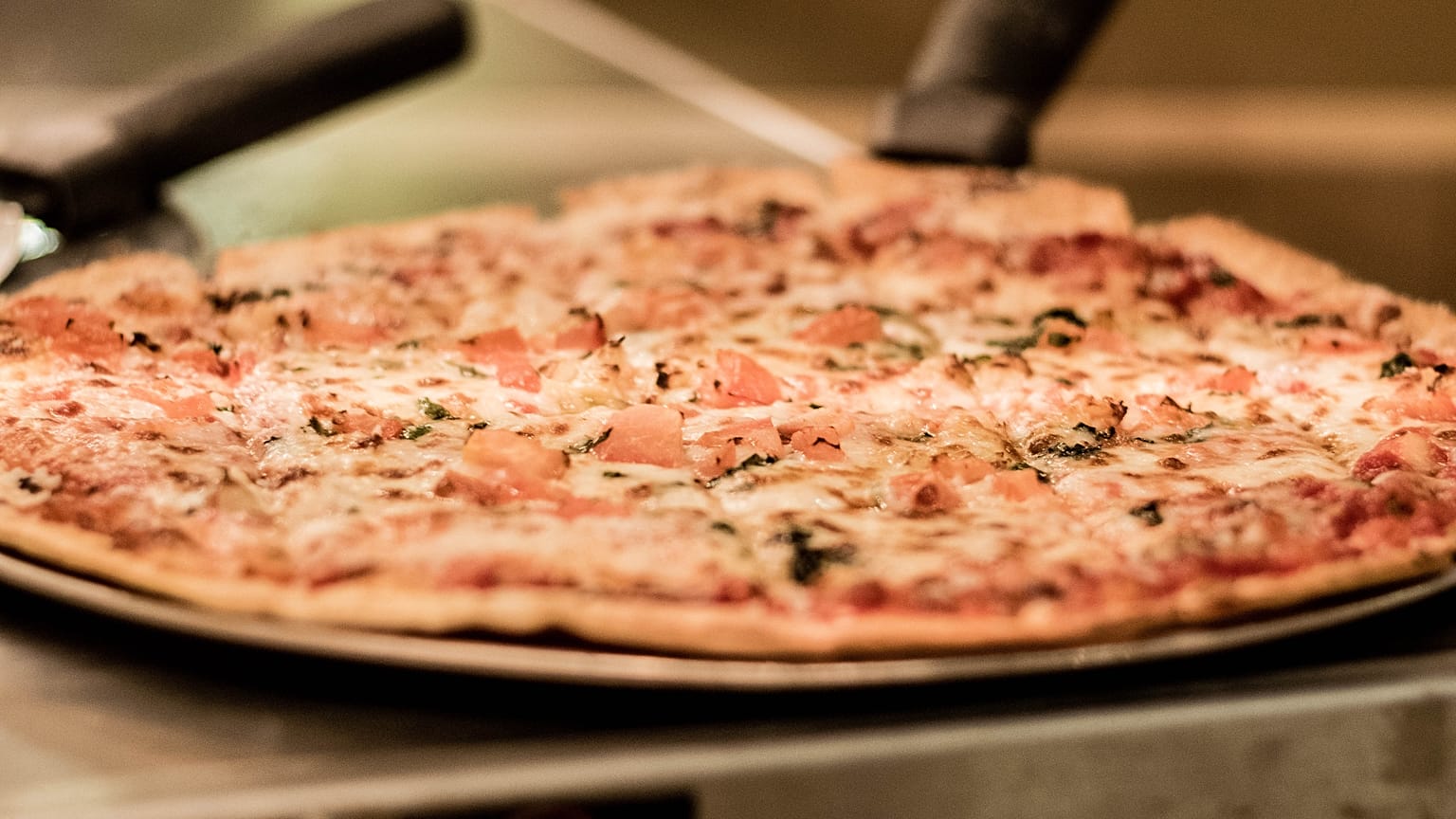 E.coli auf Tiefkühlpizzen sind offenbar für den Tod von zwei Kindern und Lebensmittelvergiftungen von dutzenden weiteren verantwortlich.