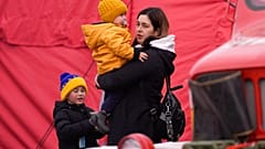 Refugees from Ukraine arrive to the border crossing Vysne Nemecke, Slovakia, Tuesday, March 1, 2022. 