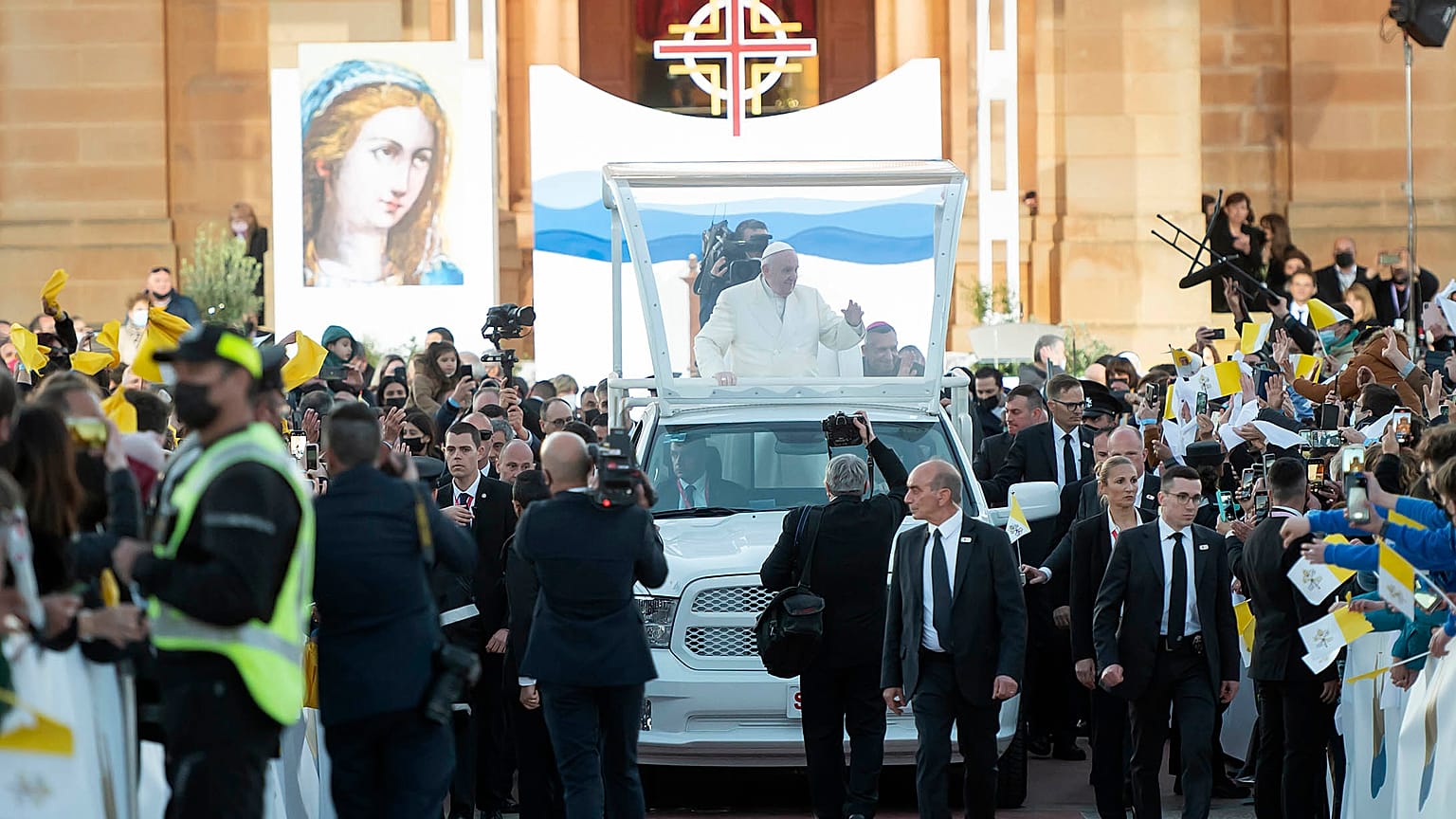 Pope Francis waves as he leaves the Ta' Pinu national sanctuary in Gharb on the Maltese island of Gozo, Saturday, April 2, 2022