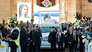 Pope Francis waves as he leaves the Ta' Pinu national sanctuary in Gharb on the Maltese island of Gozo, Saturday, April 2, 2022