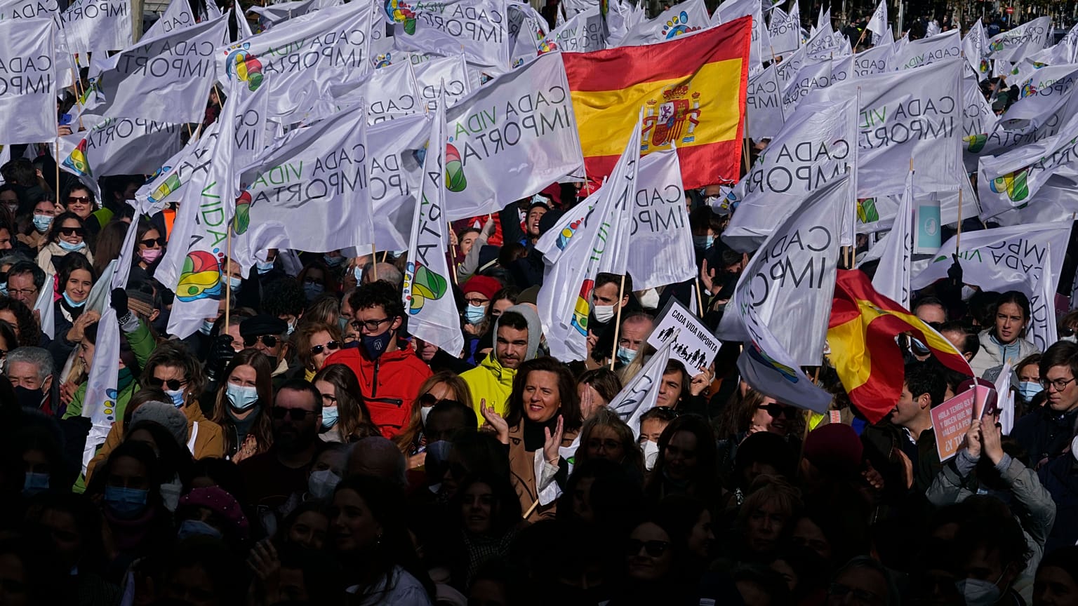 People applaud during a protest against abortion and euthanasia in Madrid in November.
