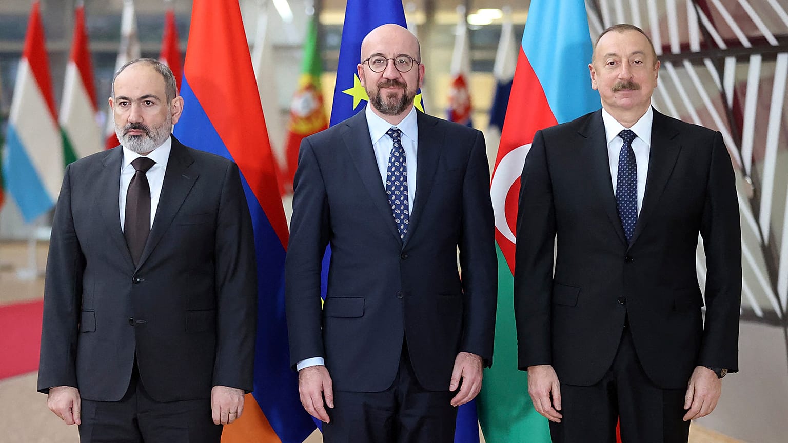 Armenian Prime Minister Nikol Pashinyan(L), European Council President Charles Michel (C), and Azerbaijan's President Ilham Aliyev (R).