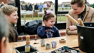 Danish Prime Minister Mette Frederiksen meets Ukrainian refugee children at Paradisbakken school in Nexoe, as she visits the island of Bornholm in Denmark. April 7, 2022