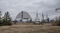 A view of the shelter construction covers the exploded reactor at the Chernobyl nuclear plant, in Chernobyl, Ukraine, Tuesday, April 5, 2022.