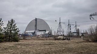 A view of the shelter construction covers the exploded reactor at the Chernobyl nuclear plant, in Chernobyl, Ukraine, Tuesday, April 5, 2022.