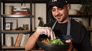Qatari chef Khaled Alrayes cooking an Iftar meal in Doha, Qatar 