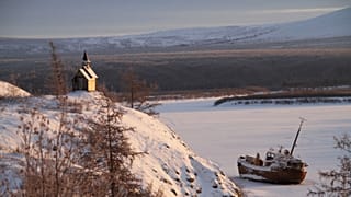 File - A tiny chapel is seen on the grounds of the Northeast Science Station near the town of Chersky in Siberia, Russia, Oct. 26, 2010.