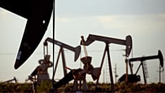 Pumpjacks work in a field near Lovington, N.M. April 24, 2015.