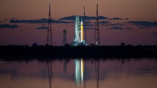 The Space Launch System (SLS) rocket with the Orion spacecraft aboard is seen atop a mobile launcher at NASA's Kennedy Space Center on Monday, April 4, 2022.