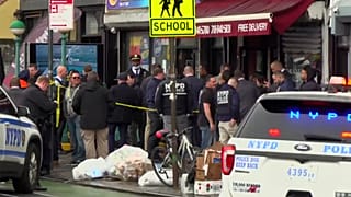 This still image provided by WABC shows law enforcement gathering at the scene of a shooting in the Brooklyn borough of New York on Tuesday, April 12, 2022.
