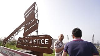 Ziad Daouk and Leonardo Moqdad stand next to the ruins of The Port of Beirut, Lebanon