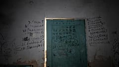 The names of the dead were scrawled on the basement's entrance