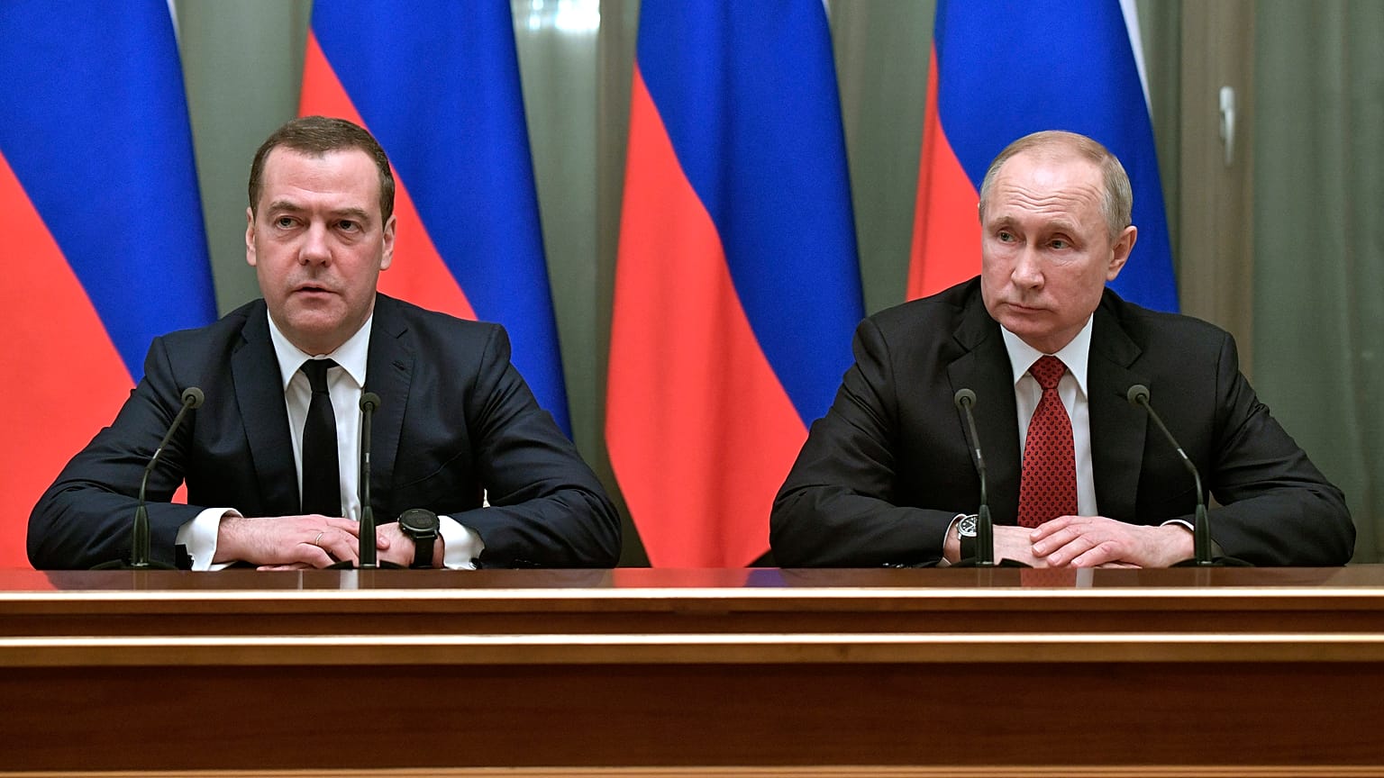 Russian President Vladimir Putin, right, and Russian Prime Minister Dmitry Medvedev attend a cabinet meeting in Moscow, Russia, Wednesday, Jan. 15, 2020. 