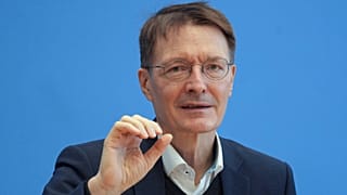 German Health Minister Karl Lauterbach addresses the media during a press conference in Berlin, Germany, Friday, Feb. 25, 2022 on the current coronavirus pandemic in Germany