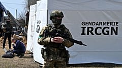 Работа французских жандармов в Буче