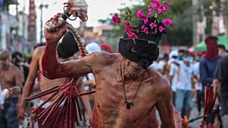To mark the holy week of Easter in the Philippines, devout Catholics take to the streets to re-enact the crucifixion of Jesus Christ